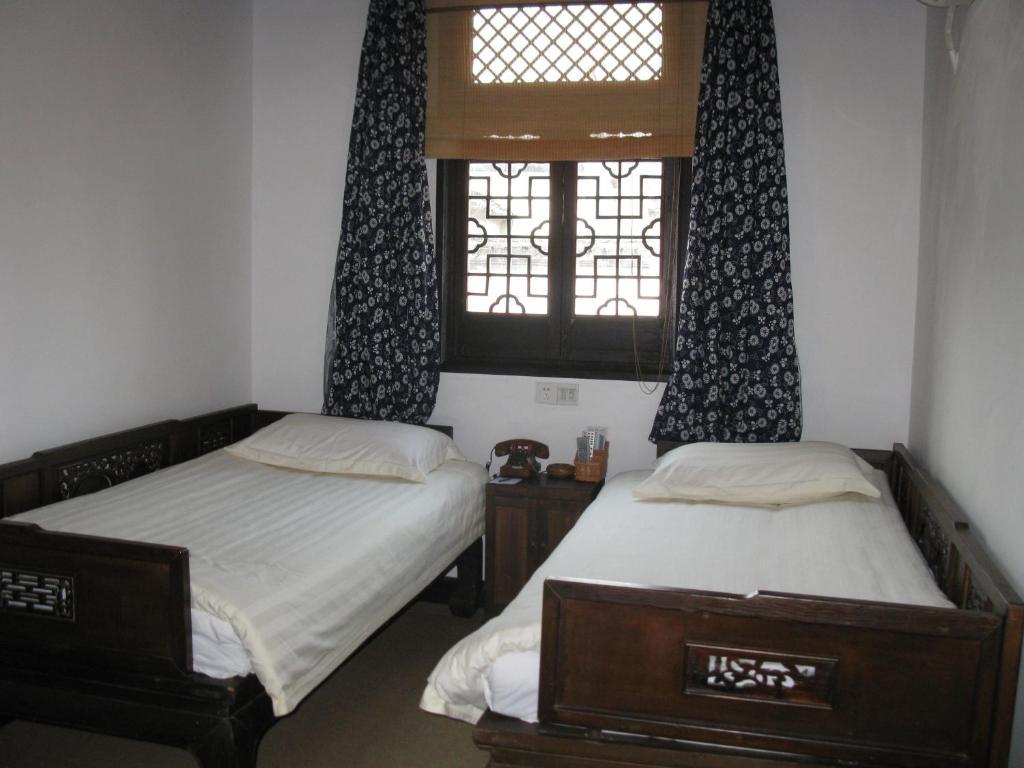 XI Di Travel Lodge Yi (Anhui) Zimmer foto
